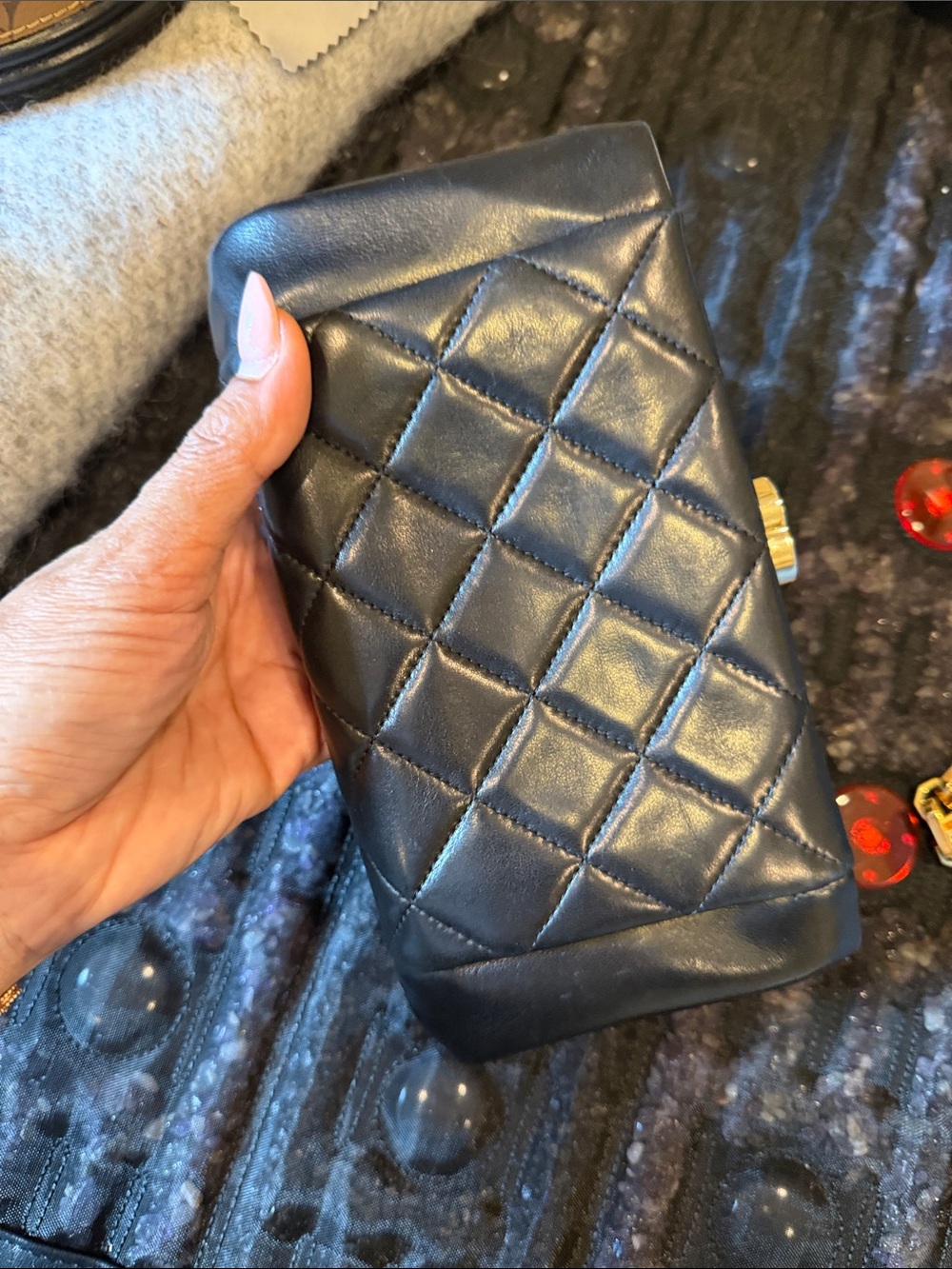 CHANEL Black Quilted Leather Triple-Compartment Wallet with Gold CC